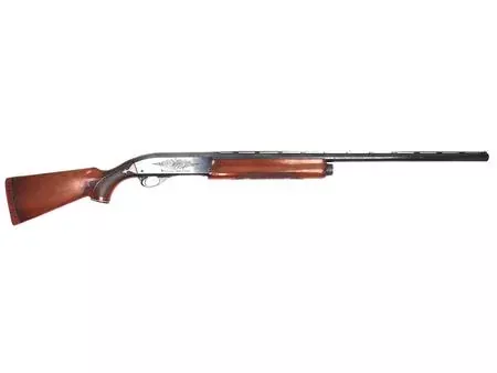 12ga Remington 1100 Left Hand Blued Wood 27.5″ Cylinder